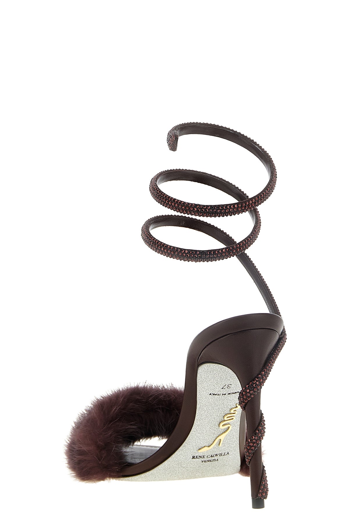 the rené caovilla cleo sandal redefines the codes of evening footwear through