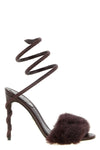 the rené caovilla cleo sandal redefines the codes of evening footwear through