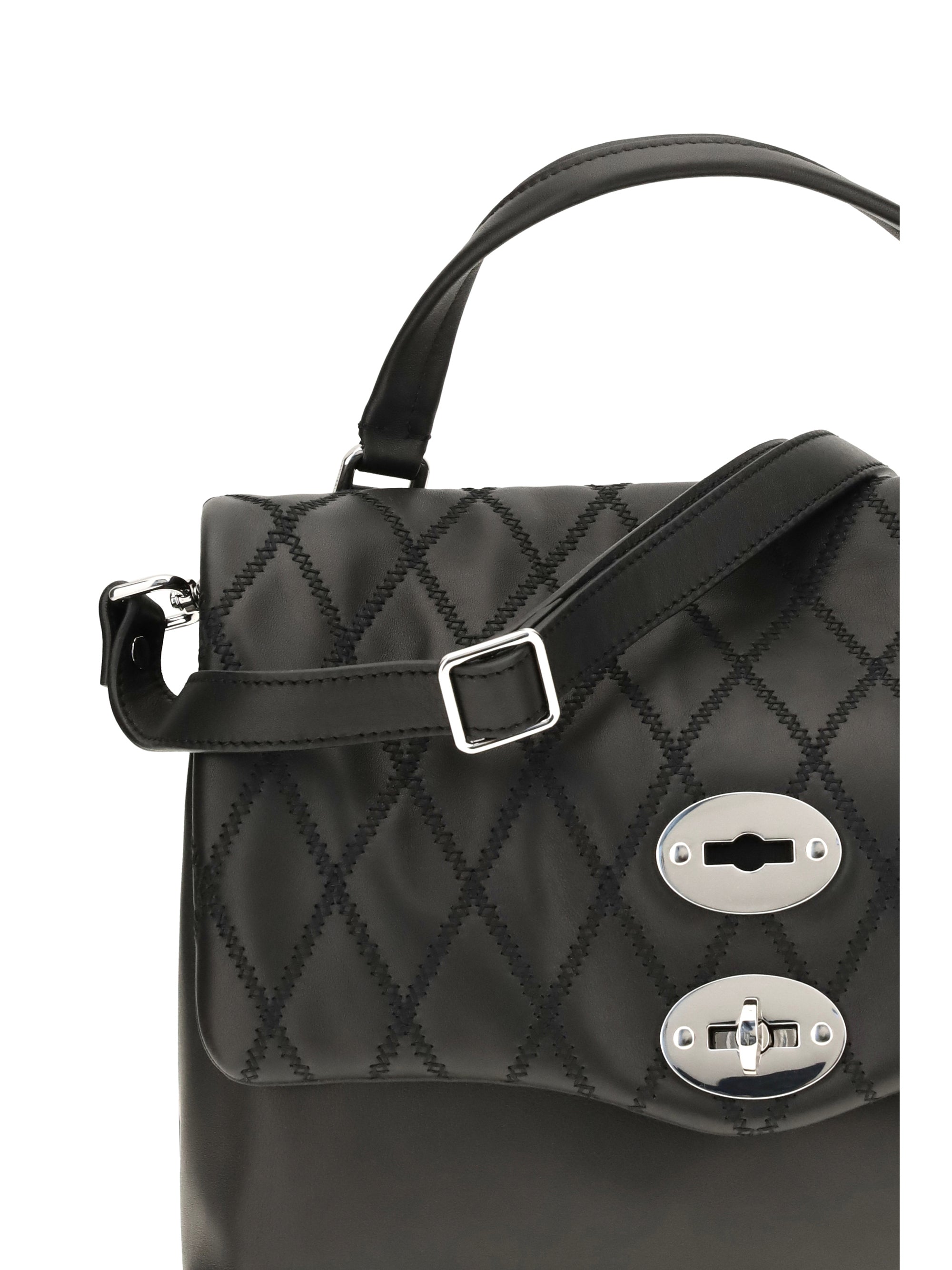 postina tramè leather top handle bag