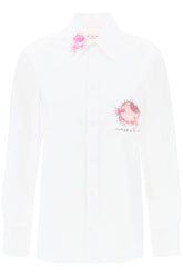 "shirt with flower print patch and embroidered logo