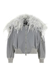 the attico bomber jacket stands out for its bold aesthetic that blends sporty vo