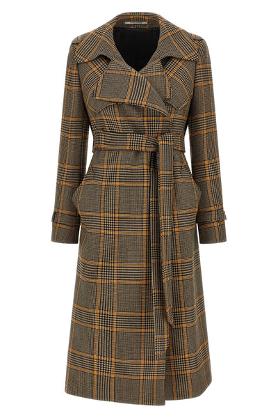 the tagliatore carola long coat redefines outerwear through a rigorous trench-