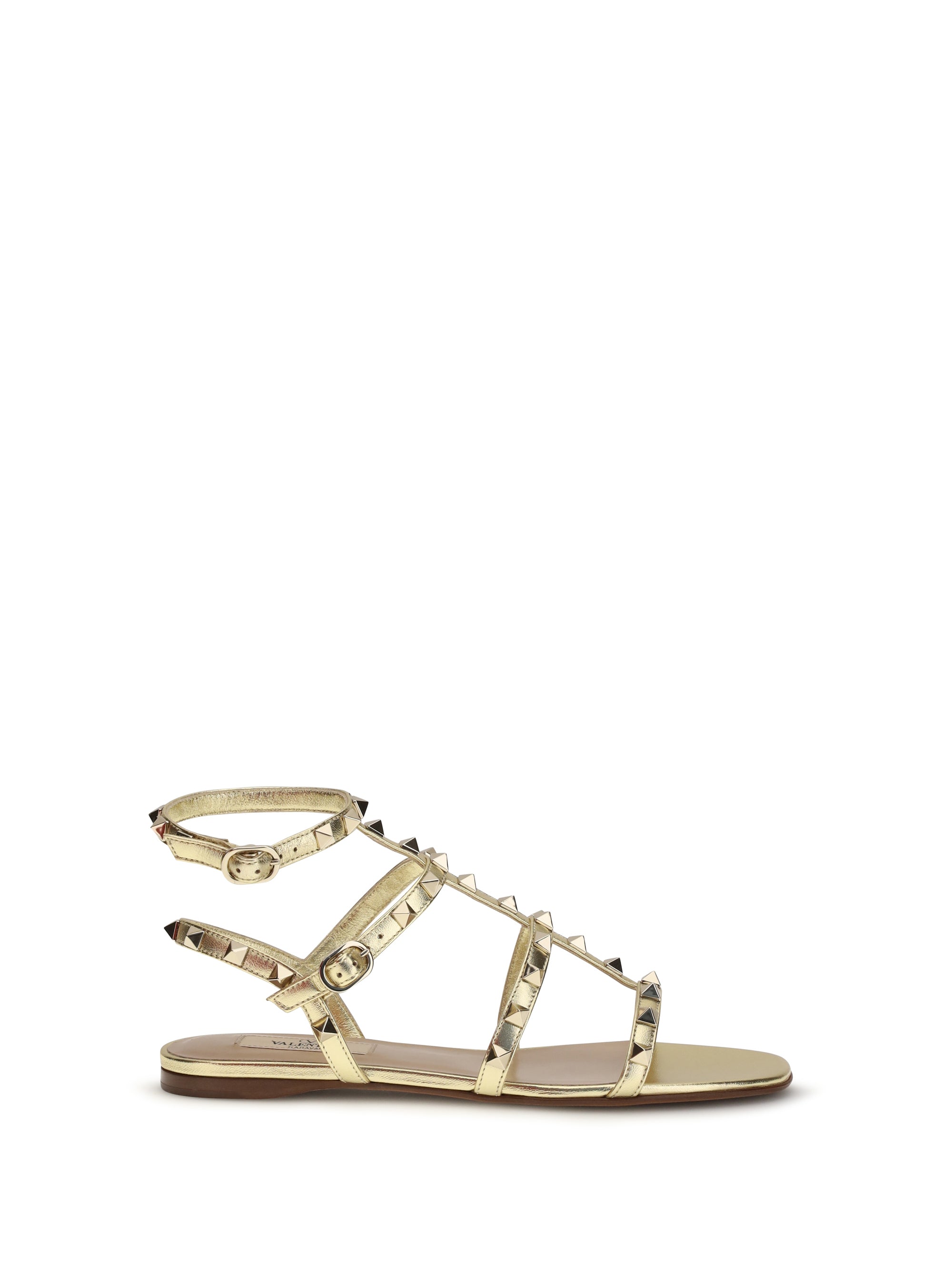 rockstud flat sandals laminated leather