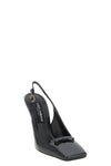 the dolce & gabbana slingback in black shiny calf leather defines the silhouette