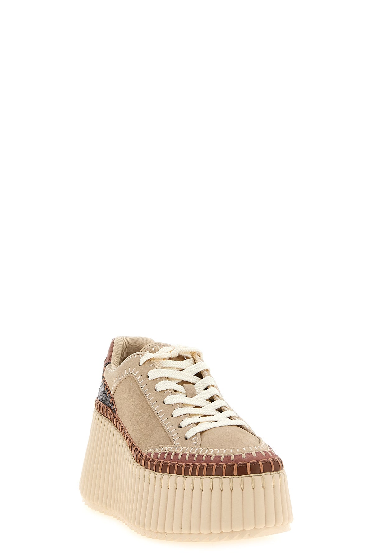 nama chloe platform sneakers redefine the volumes of contemporary footwear throu