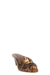 the chloé jelly sabot redefines the codes of summer footwear through a sculptura