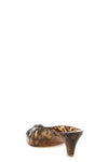 the chloé jelly sabot redefines the codes of summer footwear through a sculptura
