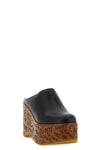the chloé maxime wedge sabot redefines the proportions of contemporary footwear