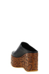 the chloé maxime wedge sabot redefines the proportions of contemporary footwear