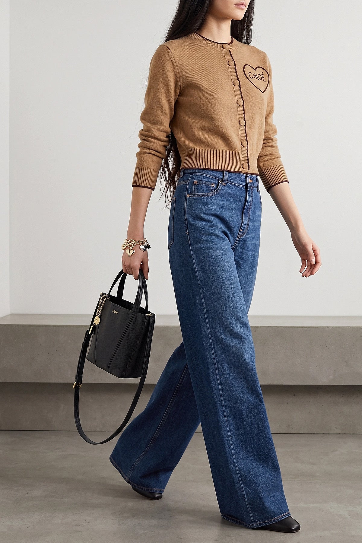 the chloé cardigan defines a tight and shortened silhouette through a fine proce