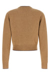 the chloé cardigan defines a tight and shortened silhouette through a fine proce