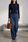 chloés tight pure wool cardigan redefines knitwear through precise sartorial de