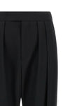 chloé trousers redefine contemporary tailoring through fluid volumes and unexpec