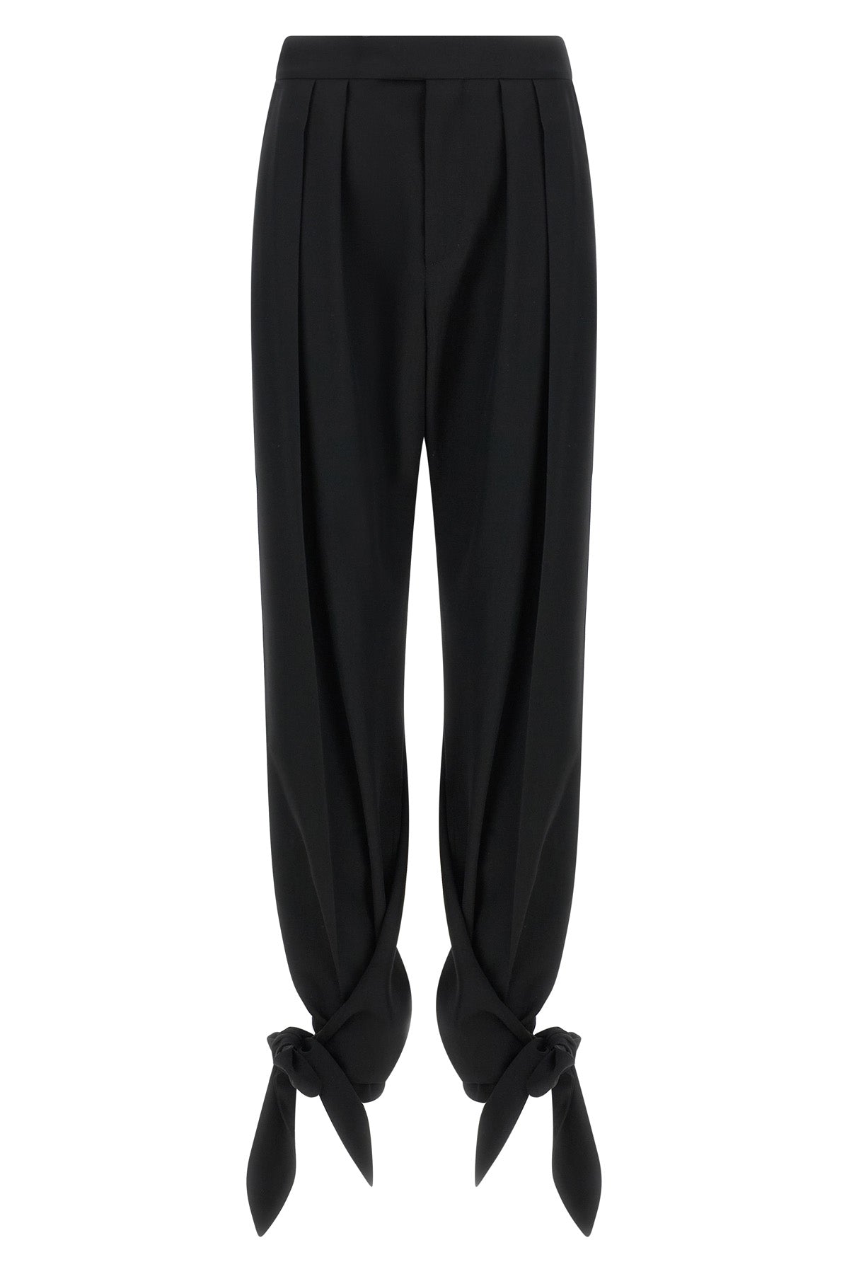 chloé trousers redefine contemporary tailoring through fluid volumes and unexpec