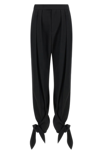 chloé trousers redefine contemporary tailoring through fluid volumes and unexpec