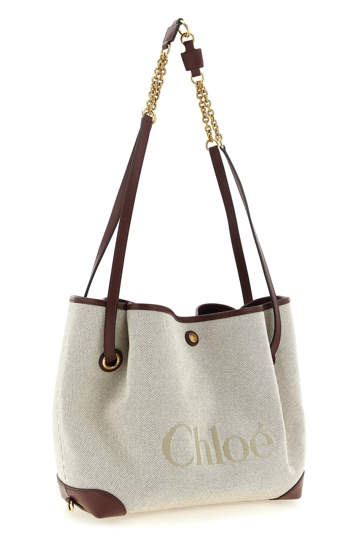 the chloé clover shoulder bag in cotton canvas stands out for its versatile silh