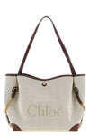 the chloé clover shoulder bag in cotton canvas stands out for its versatile silh