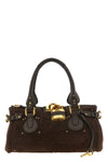the chloé paddington shoulder bag defines a deconstructed aesthetic through a