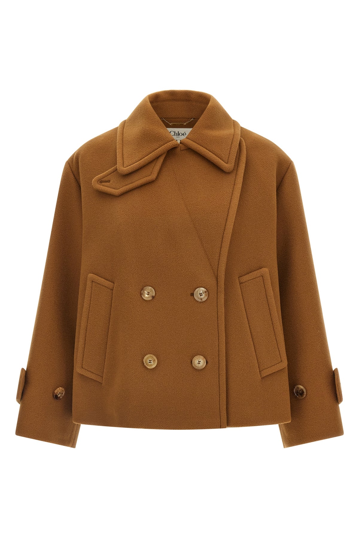 the chloé short coat redefines the codes of outerwear through a boxy silhouette