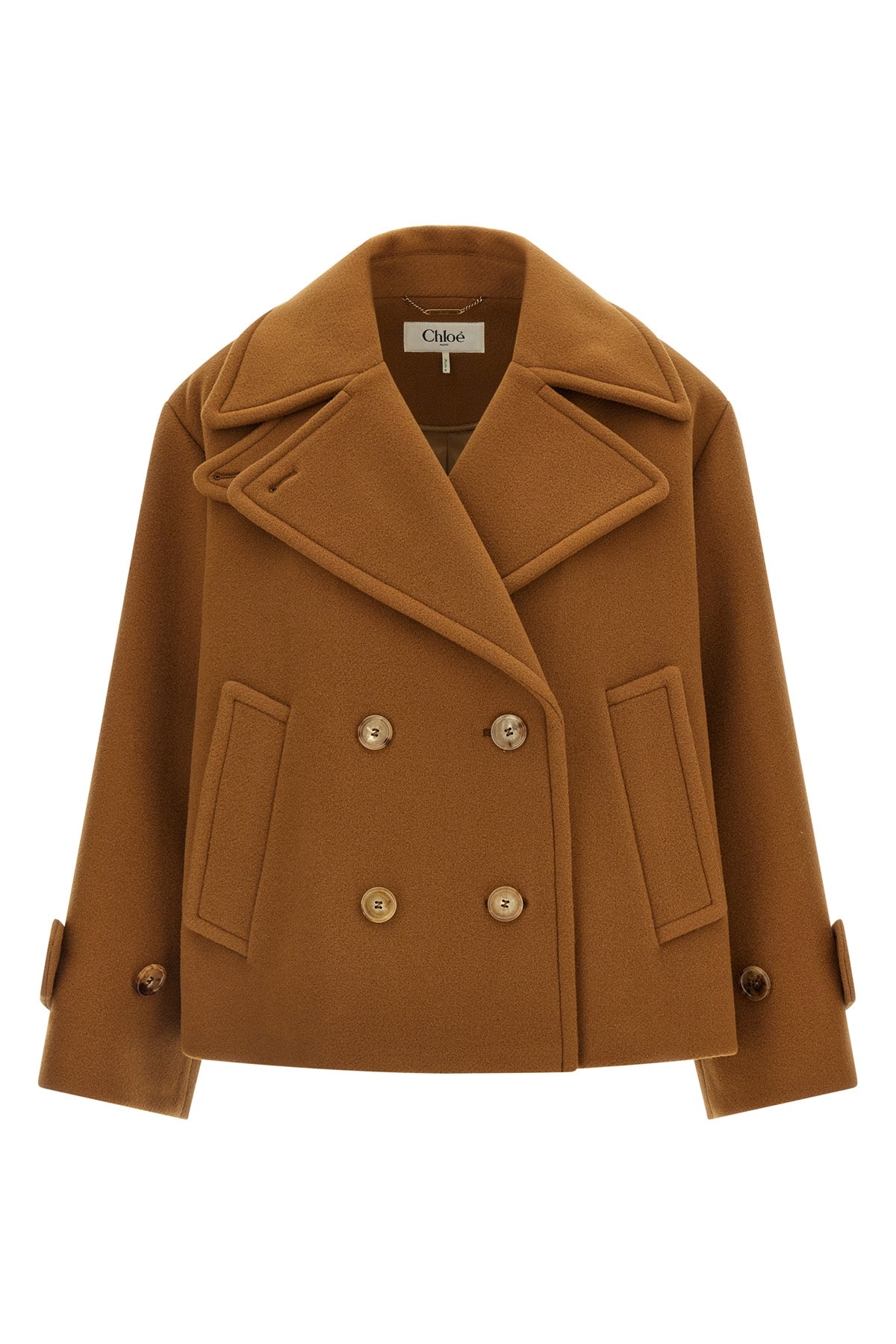 the chloé short coat redefines the codes of outerwear through a boxy silhouette