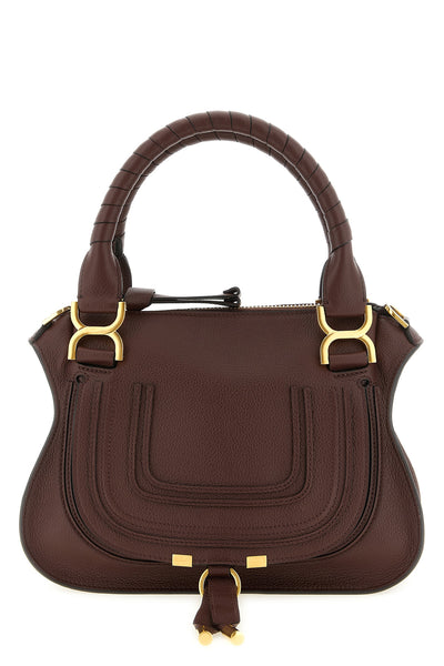 the chloé marcie handbag is made of fine hammered calf leather in a deep brown t