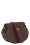 the chloé marcie saddle shoulder bag defines a structured aesthetic through a