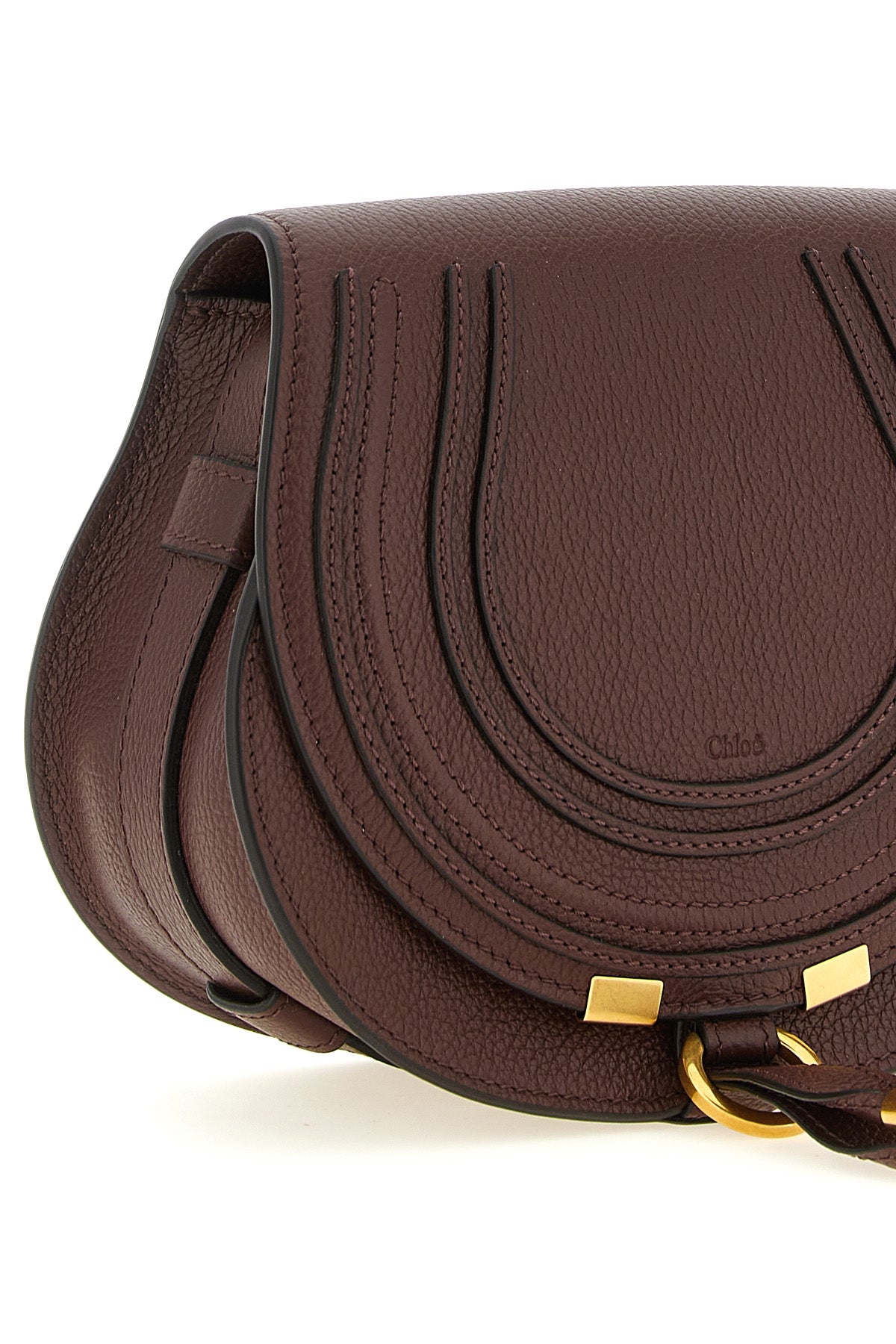 the chloé marcie saddle shoulder bag defines a structured aesthetic through a