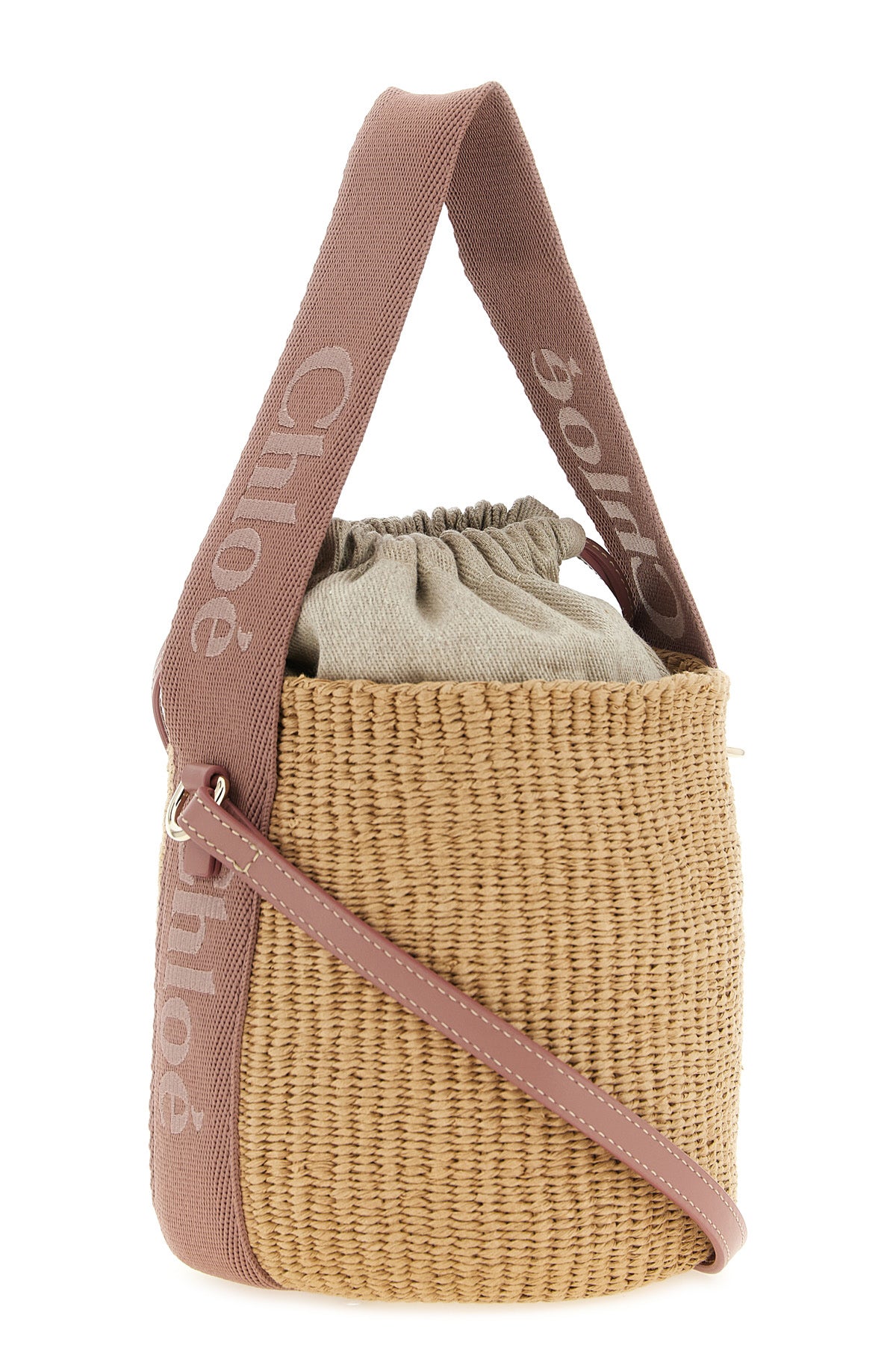 the chloé small woody bucket bag enhances craftsmanship through a compact struct