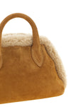 the coperni duffle belt bag camel suede belt bag is distinguished by a structu