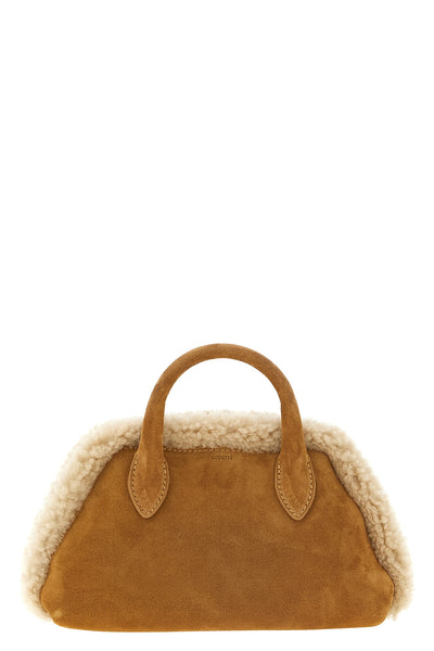 the coperni duffle belt bag camel suede belt bag is distinguished by a structu