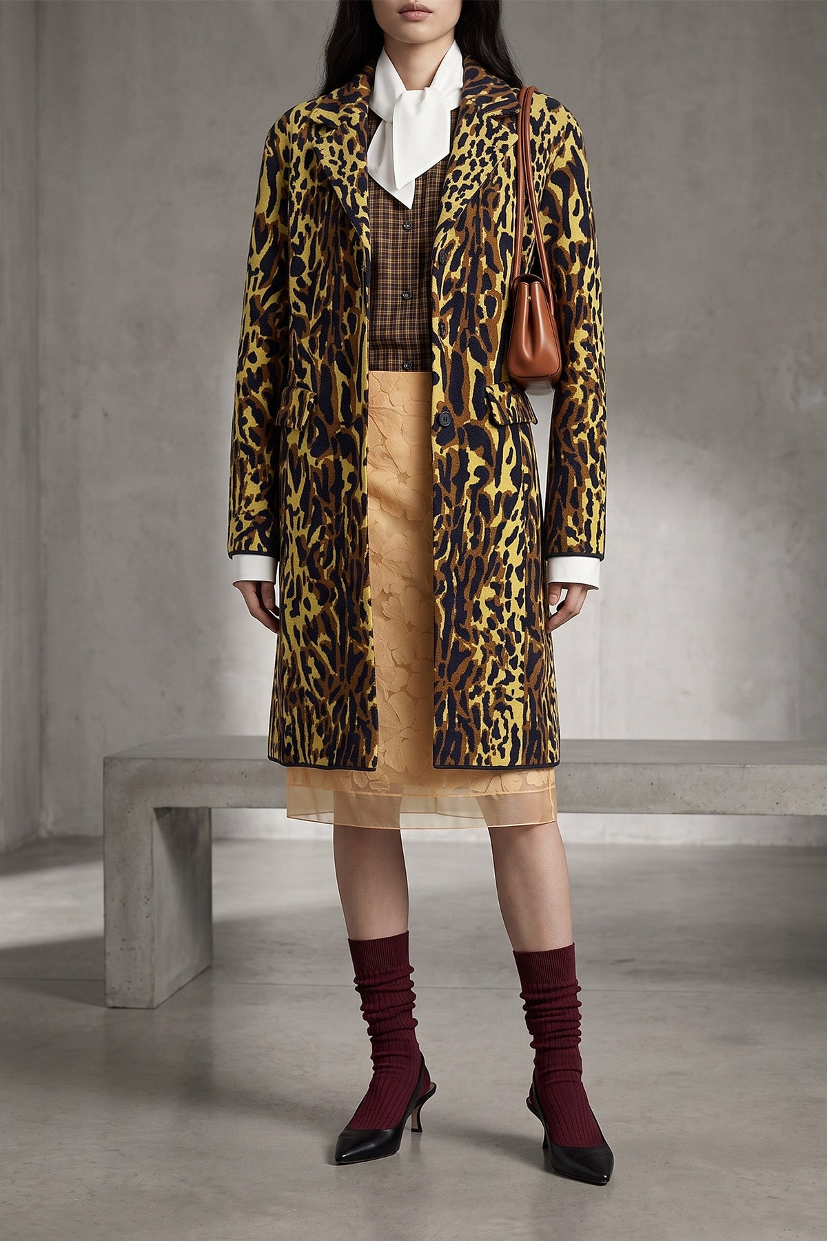 the marni coat redefines contemporary outerwear through a bold abstract animal p