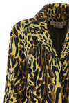 the marni coat redefines contemporary outerwear through a bold abstract animal p