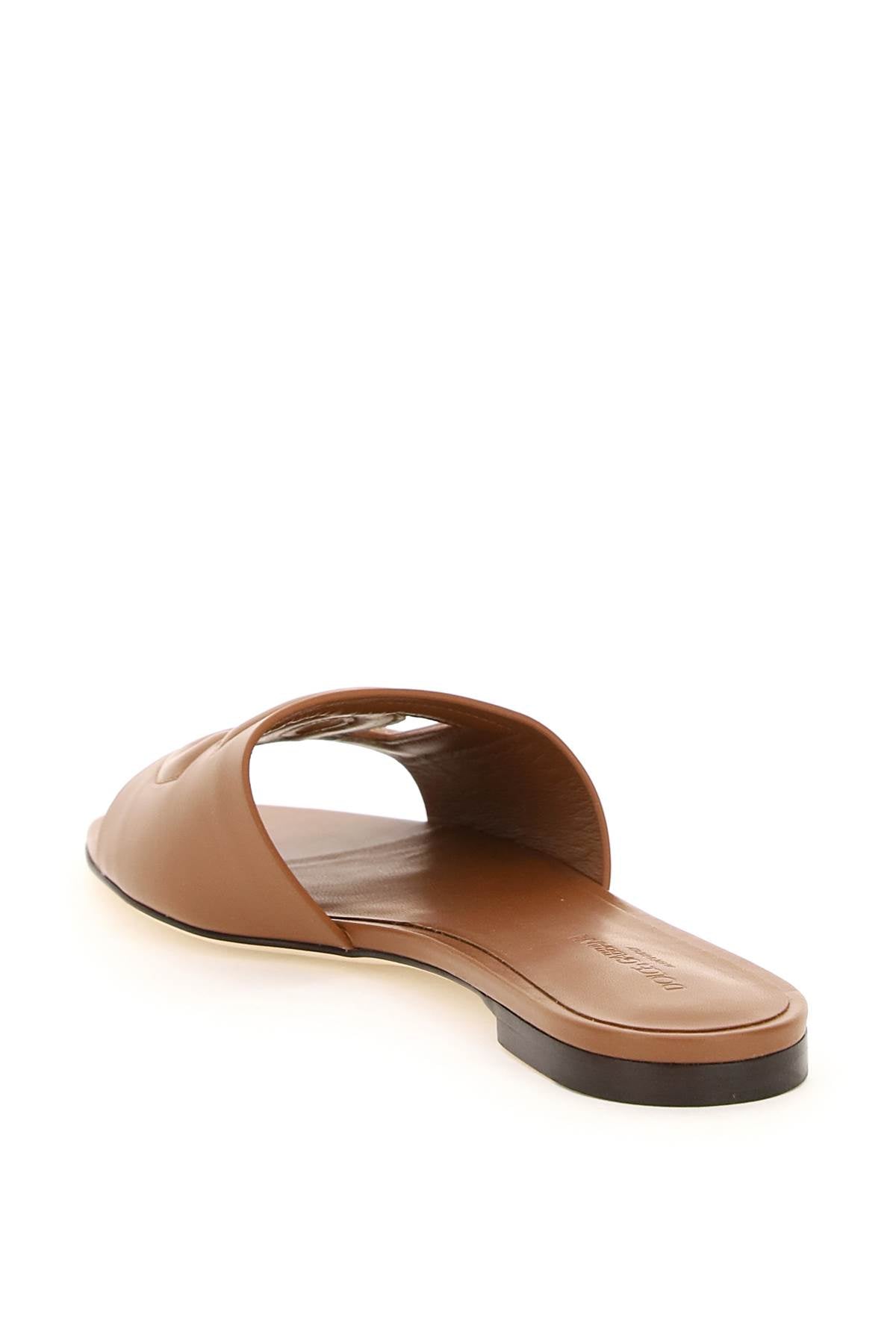 leather slides with cut-out logo