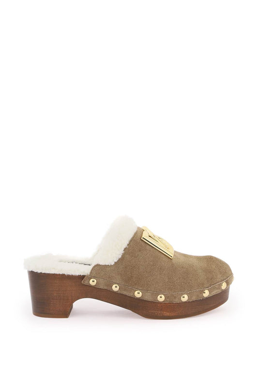 suede and faux fur clogs with dg logo.
