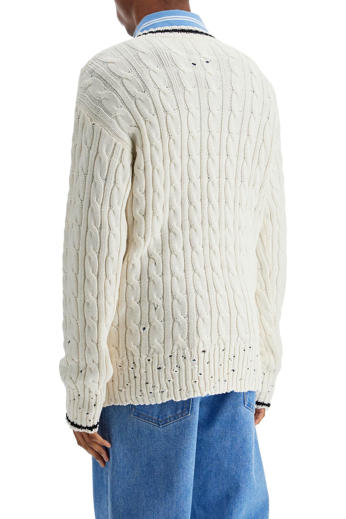 white cotton sweater with cable knit v-neck