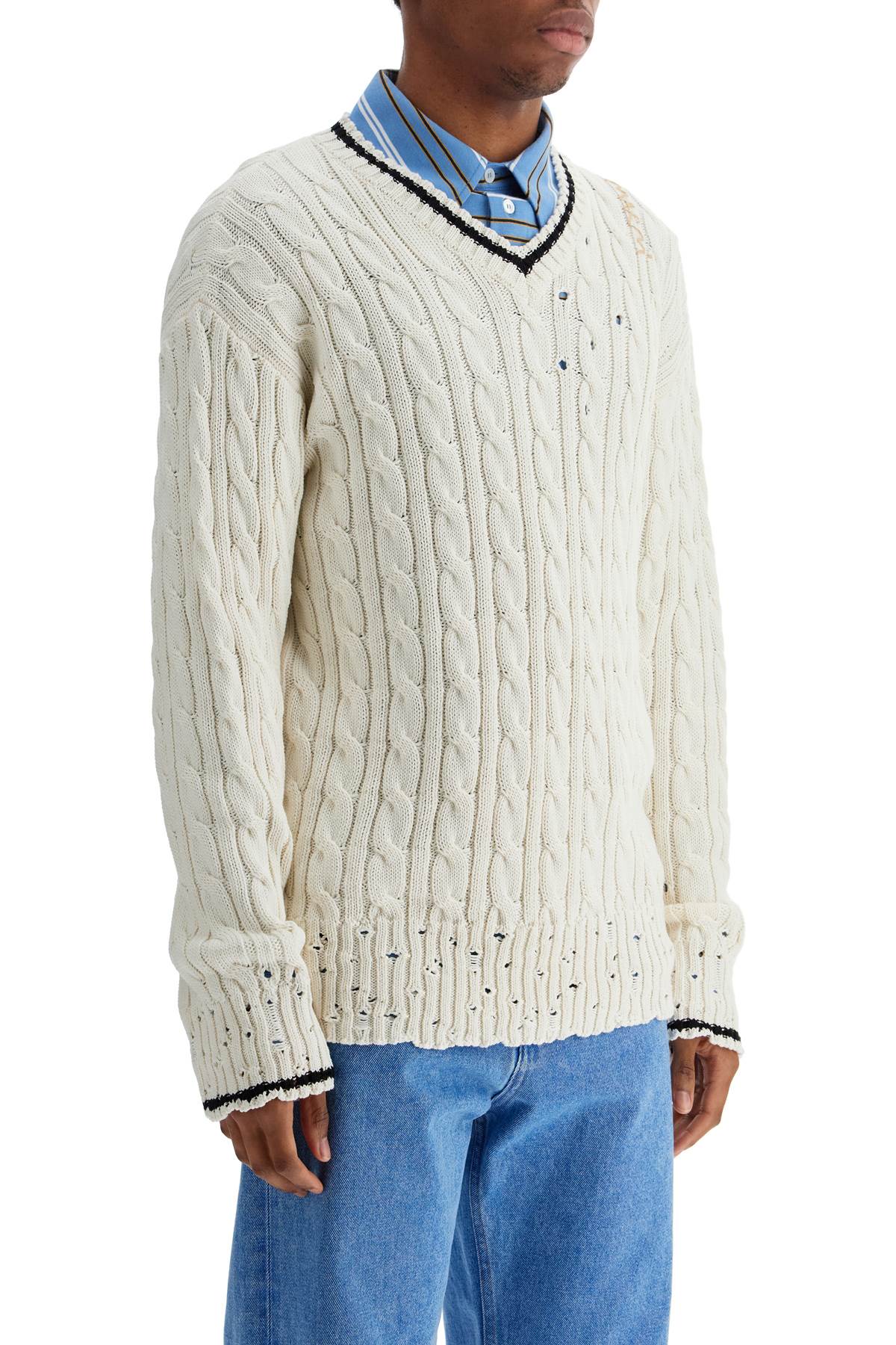 white cotton sweater with cable knit v-neck