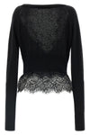 the ermanno scervino cardigan in pure black cashmere stands out for a sartorial