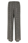 ermanno scervino trousers redefine contemporary elegance through a wide-leg silh