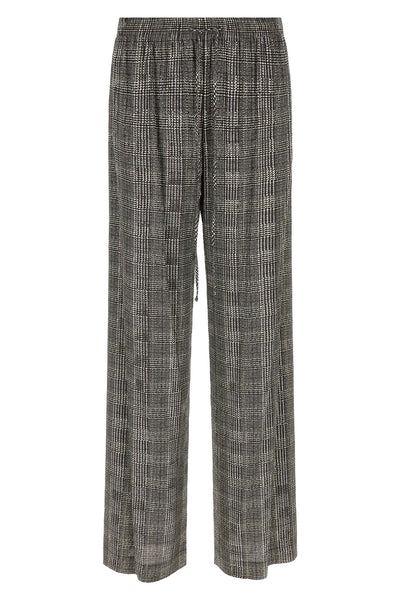ermanno scervino trousers redefine contemporary elegance through a wide-leg silh