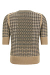 the ermanno scervino short-sleeved sweater stands out for its sophisticated knit