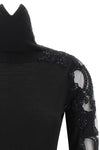 the ermanno scervino high neck sweater in pure black virgin wool stands out for