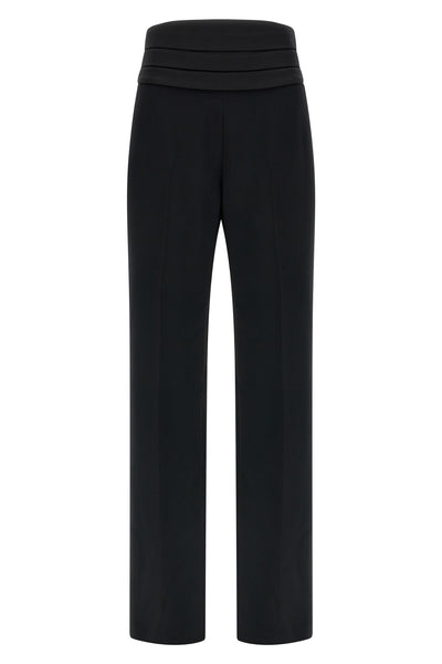 the tuxedo-inspired trousers by ermanno scervino define a slender silhouette thr