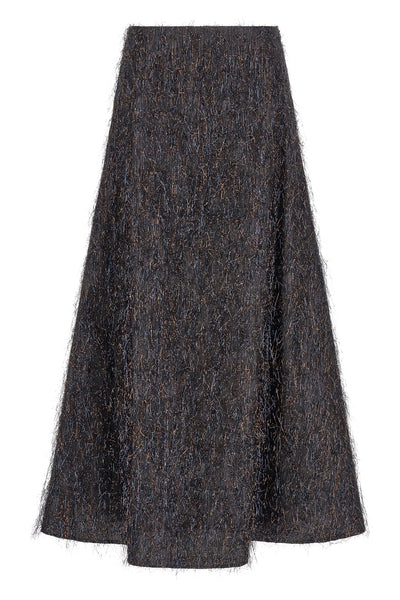 the peserico skirt defines the volumes of the wardrobe through an a-shaped model