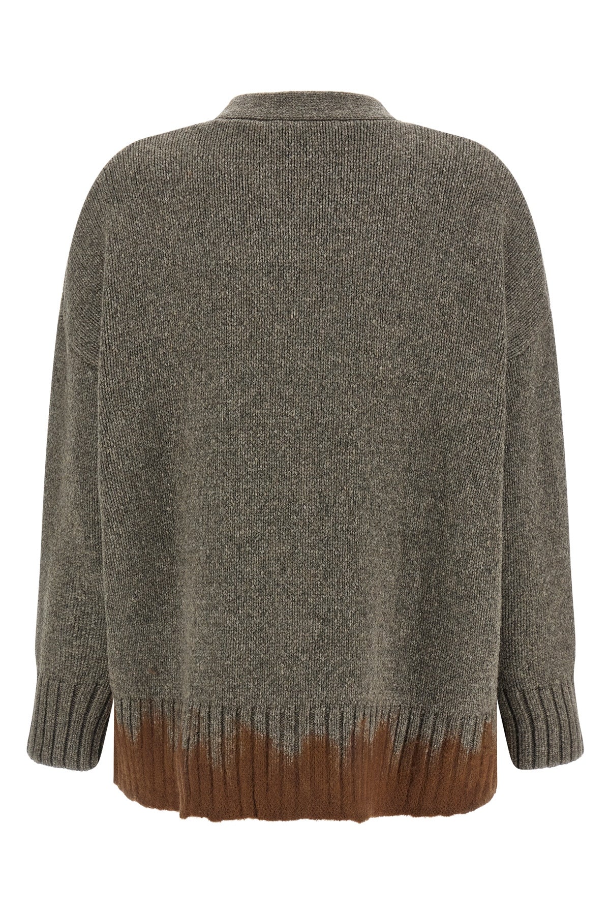 the tela tawan cardigan redefines contemporary knitwear through a bold play of c