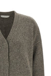 the tela tawan cardigan redefines contemporary knitwear through a bold play of c