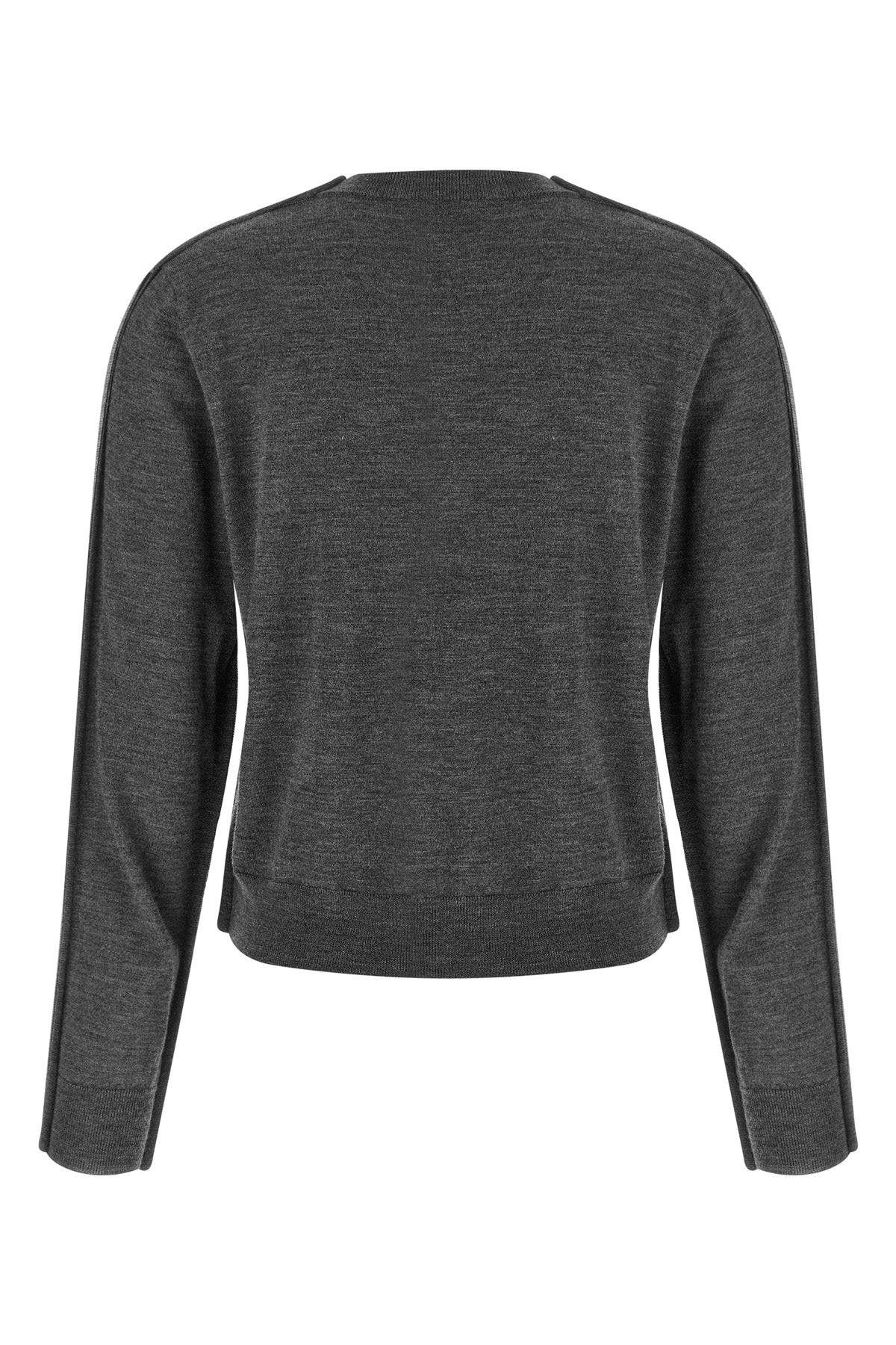 the winny canvas cardigan redefines essential knitwear through unexpected stru