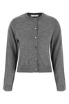 the winny canvas cardigan redefines essential knitwear through unexpected stru