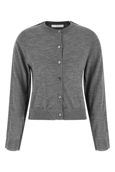 the winny canvas cardigan redefines essential knitwear through unexpected stru