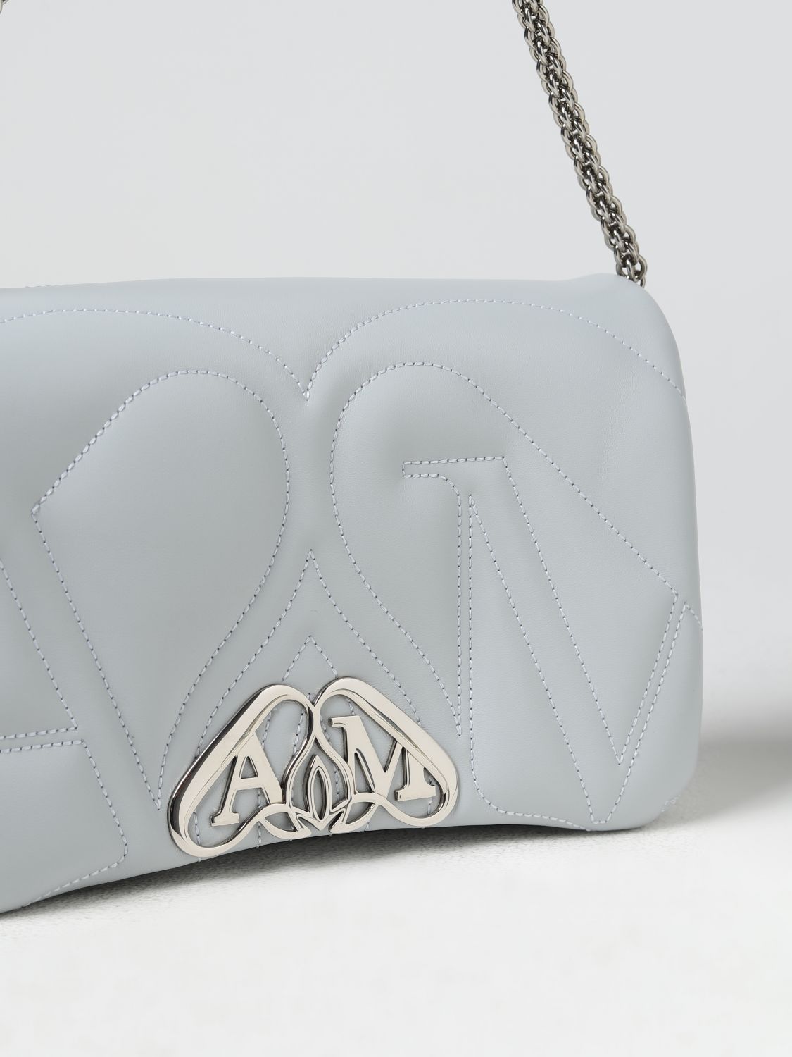 MCQUEEN OS seal bag in leather with quilted monogram
