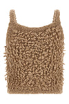 peserico cropped top redefines contemporary knitwear through tactile volumes and